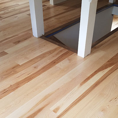 Read more about the article Unfinished vs. Prefinished Hardwoods: Which Is Right For You?